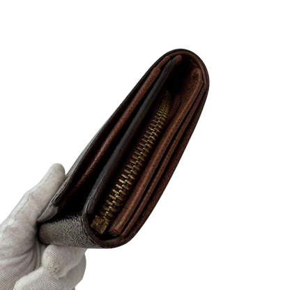 https://cdn.shopify.com/s/files/1/0564/9376/8855/files/Louis_Vuitton_Geldbeutel_Portefeuille_Tresor_monogram_braun_3_2a1ec154-4e5b-411b-b888-43cb0e90bb2c.webp?v=1784270561