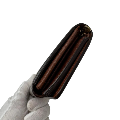https://cdn.shopify.com/s/files/1/0564/9376/8855/files/Louis_Vuitton_Geldbeutel_Portefeuille_Tresor_monogram_braun_4_4075f5c2-66d6-49a5-afe0-c9177441d797.webp?v=1784270561