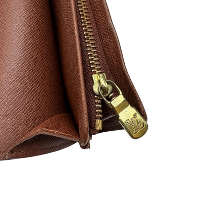 https://cdn.shopify.com/s/files/1/0564/9376/8855/files/Louis_Vuitton_Geldbeutel_Portefeuille_Tresor_monogram_braun_9_660fbe28-4e4c-4615-824e-49ac2fede5cc.webp?v=1784270561
