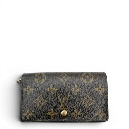 https://cdn.shopify.com/s/files/1/0564/9376/8855/files/Louis_Vuitton_Geldbeutel_Portefeuille_Tresor_monogram_braun_vintage_LV8207.webp?v=1781083289