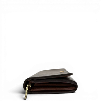 https://cdn.shopify.com/s/files/1/0564/9376/8855/files/Louis_Vuitton_Geldbeutel_Portefeuille_Tresor_monogram_braun_vintage_LV8211.webp?v=1781083289