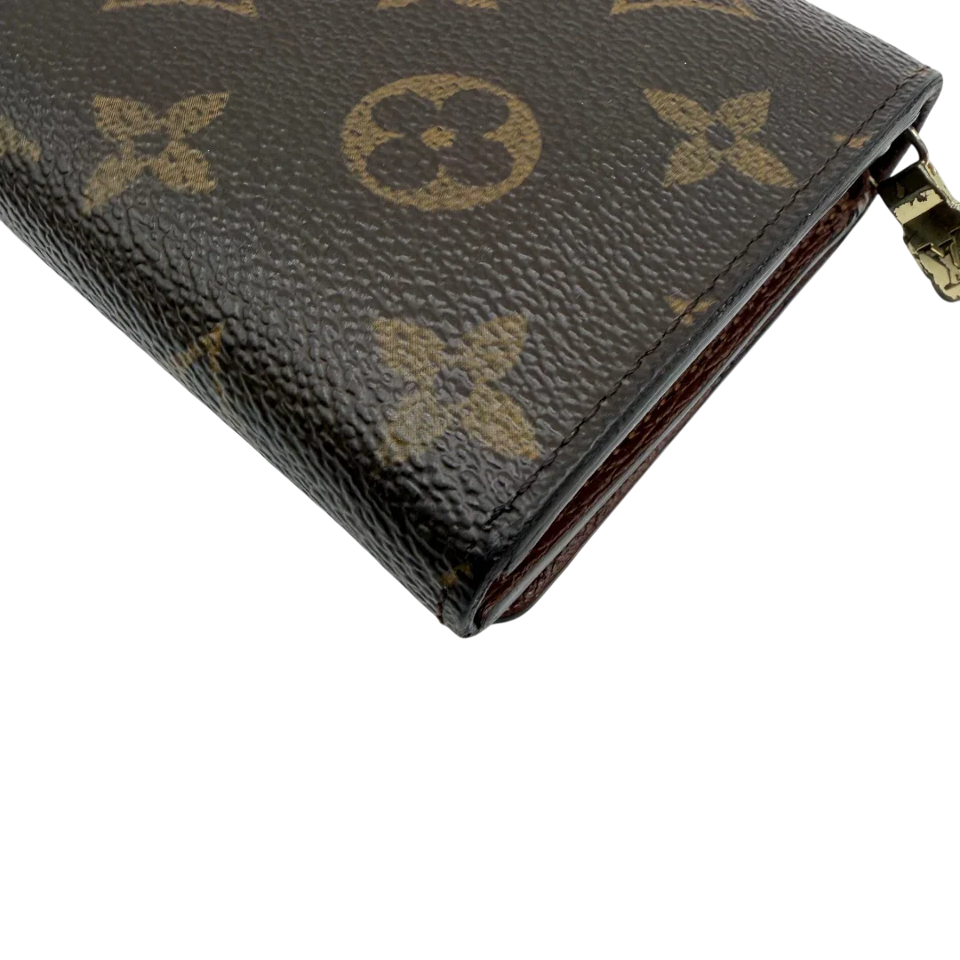 https://cdn.shopify.com/s/files/1/0564/9376/8855/files/Louis_Vuitton_Geldbeutel_Portefeuille_Tresor_monogram_braun_vintage_LV8215.webp?v=1781083289