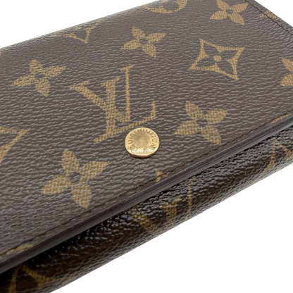 https://cdn.shopify.com/s/files/1/0564/9376/8855/files/Louis_Vuitton_Geldbeutel_Portefeuille_Tresor_monogram_braun_vintage_LV8217.webp?v=1781083289