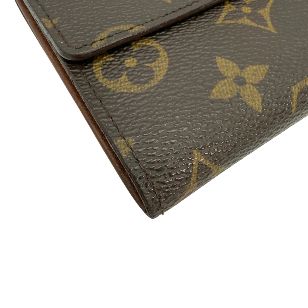 https://cdn.shopify.com/s/files/1/0564/9376/8855/files/Louis_Vuitton_Geldbeutel_Portefeuille_Tresor_monogram_braun_vintage_LV8601.webp?v=1781083966