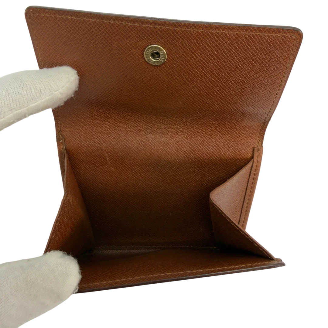 https://cdn.shopify.com/s/files/1/0564/9376/8855/files/Louis_Vuitton_Geldbeutel_Portefeuille_Tresor_monogram_braun_vintage_LV8606.webp?v=1781083966