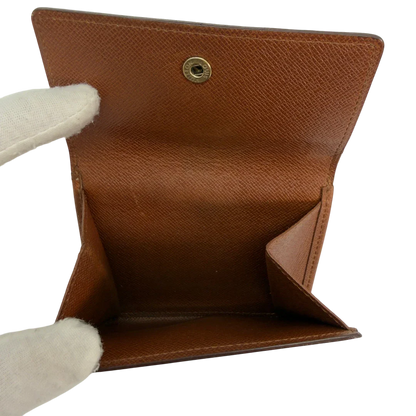 https://cdn.shopify.com/s/files/1/0564/9376/8855/files/Louis_Vuitton_Geldbeutel_Portefeuille_Tresor_monogram_braun_vintage_LV8606.webp?v=1781083966