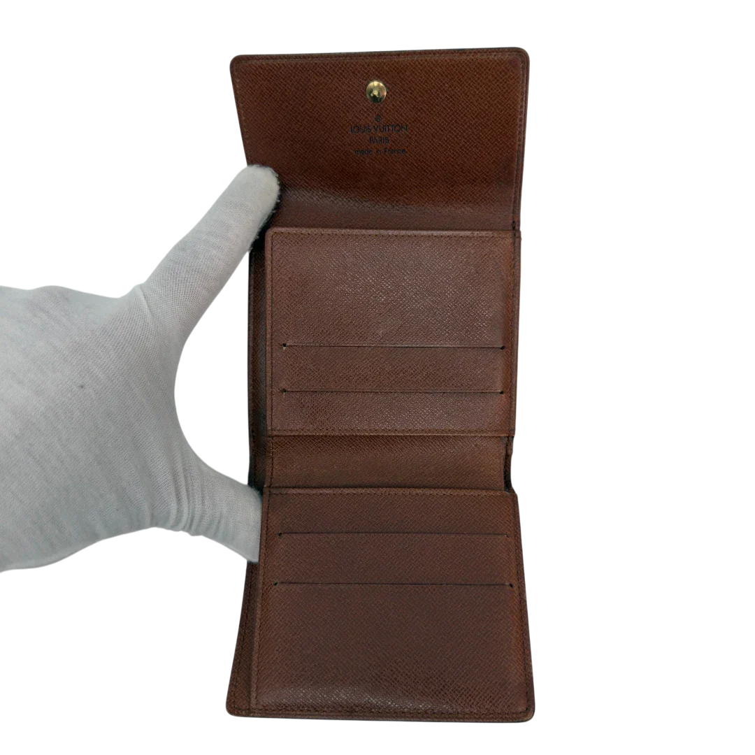 https://cdn.shopify.com/s/files/1/0564/9376/8855/files/Louis_Vuitton_Geldbeutel_Portefeuille_Tresor_monogram_braun_vintage_LV8607.webp?v=1781083966