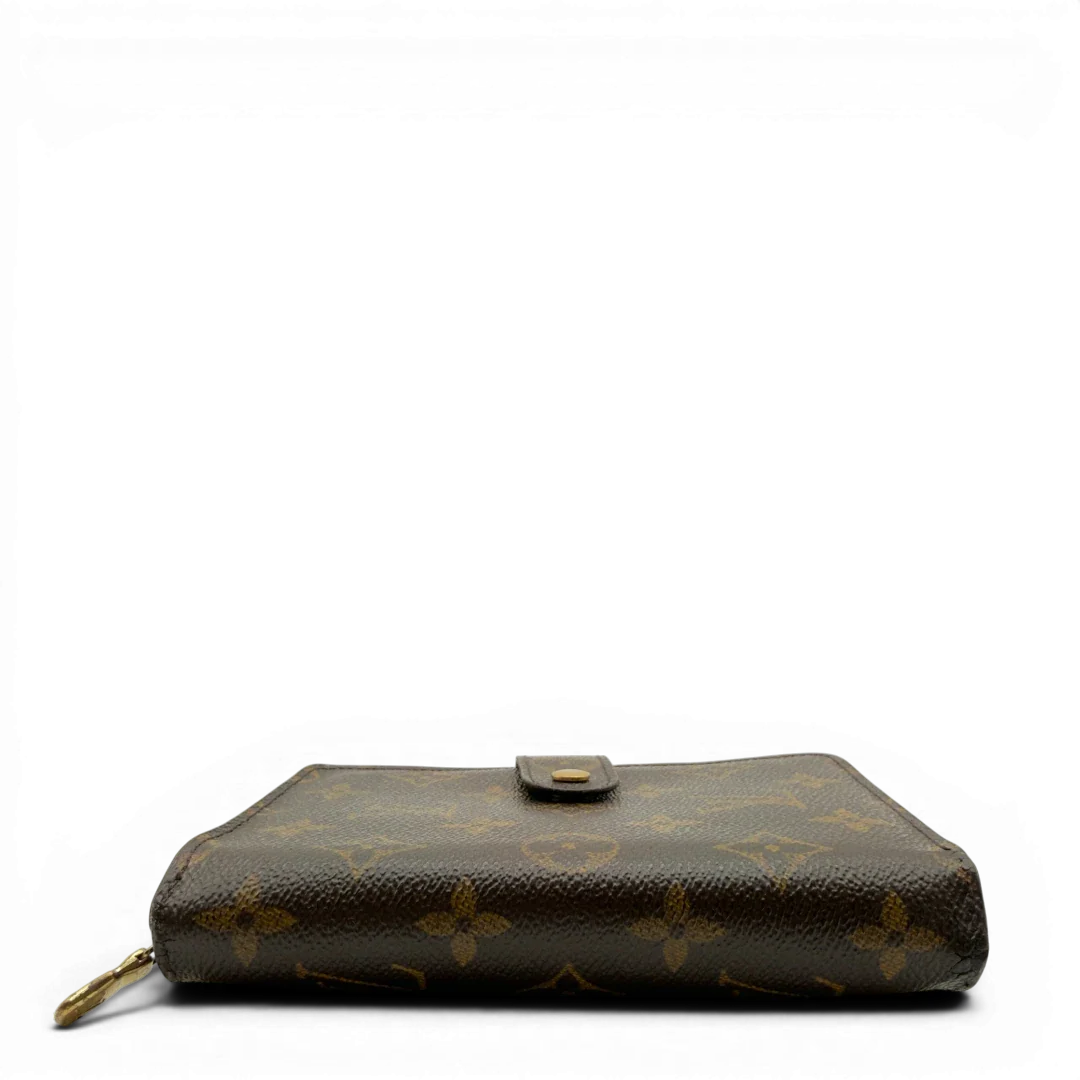 https://cdn.shopify.com/s/files/1/0564/9376/8855/files/Louis_Vuitton_Geldbeutel_Portefeuille_Zip_monogram_braun_vintage_LV6954.webp?v=1778145194