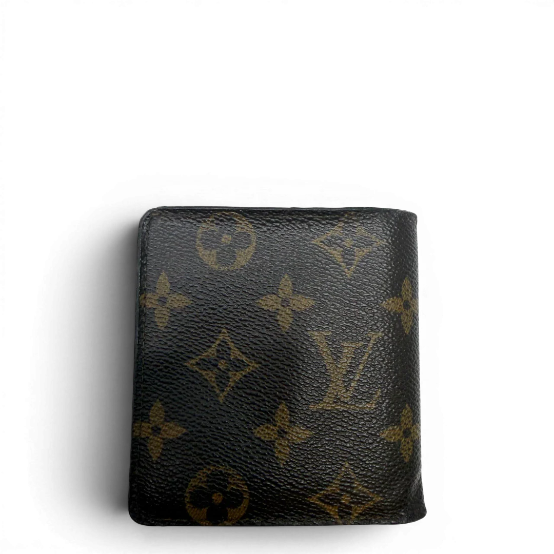 https://cdn.shopify.com/s/files/1/0564/9376/8855/files/Louis_Vuitton_Geldbeutel_Portefeuille_monogram_braun_vintage_LV7753.webp?v=1780487841