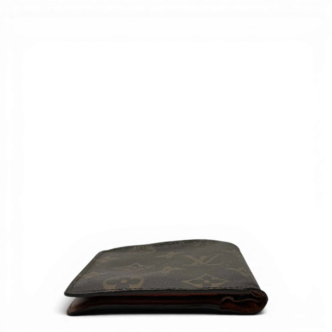 https://cdn.shopify.com/s/files/1/0564/9376/8855/files/Louis_Vuitton_Geldbeutel_Portefeuille_monogram_braun_vintage_LV7754.webp?v=1780487840