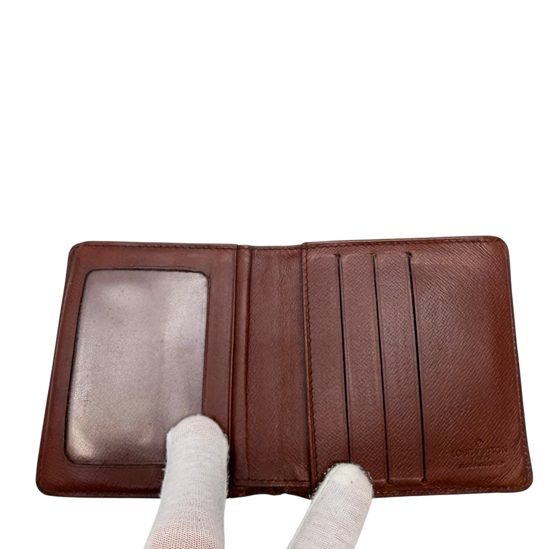 https://cdn.shopify.com/s/files/1/0564/9376/8855/files/Louis_Vuitton_Geldbeutel_Portefeuille_monogram_braun_vintage_LV7759.webp?v=1780487841