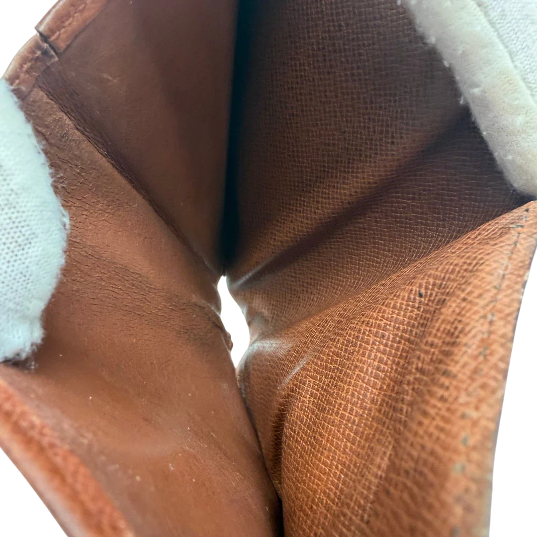 https://cdn.shopify.com/s/files/1/0564/9376/8855/files/Louis_Vuitton_Geldbeutel_Portefeuille_monogram_braun_vintage_LV7760.webp?v=1780487841