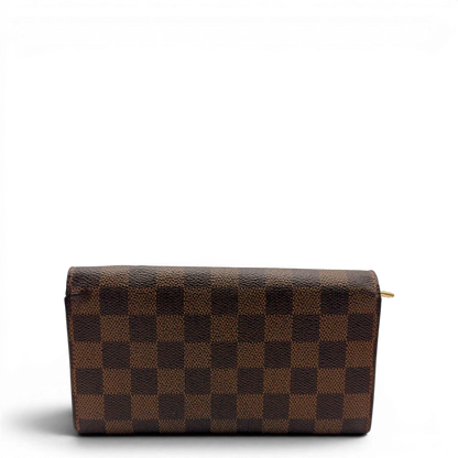 https://cdn.shopify.com/s/files/1/0564/9376/8855/files/Louis_Vuitton_Geldbeutel_Sarah_Damier_Ebene_braun_2.webp?v=1784242503
