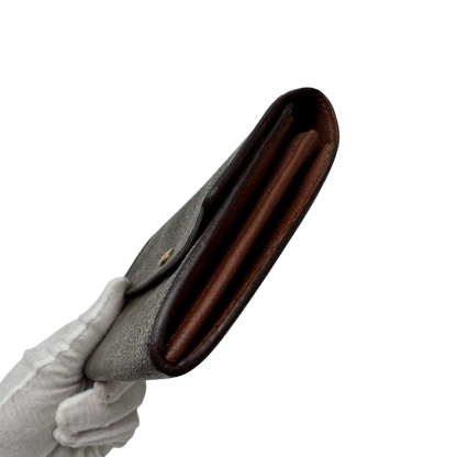 https://cdn.shopify.com/s/files/1/0564/9376/8855/files/Louis_Vuitton_Geldbeutel_Sarah_monogram_braun_4_7a34b45c-5e33-4221-8dc7-848795a45449.webp?v=1784243082