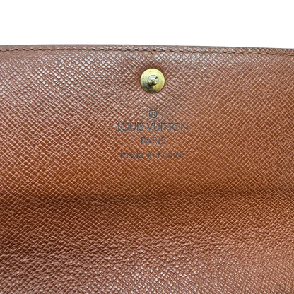 https://cdn.shopify.com/s/files/1/0564/9376/8855/files/Louis_Vuitton_Geldbeutel_Sarah_monogram_braun_7.webp?v=1784241822