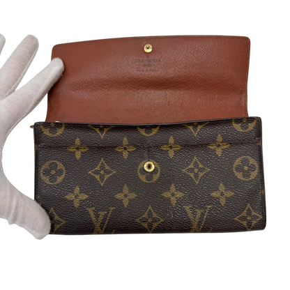 https://cdn.shopify.com/s/files/1/0564/9376/8855/files/Louis_Vuitton_Geldbeutel_Sarah_monogram_braun_8_a3357a57-6a2b-452e-843e-053523c8edec.webp?v=1784243083
