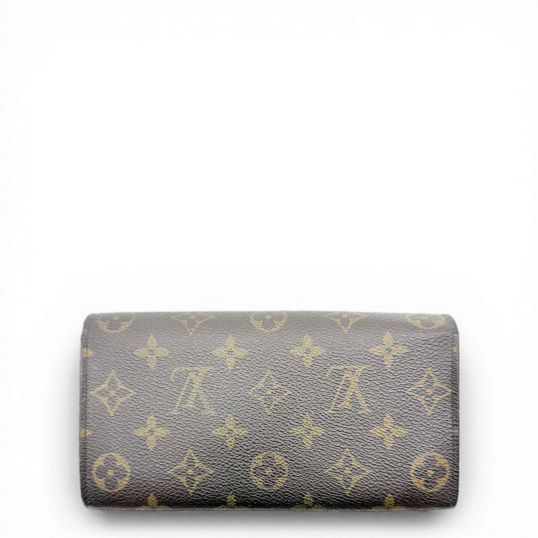https://cdn.shopify.com/s/files/1/0564/9376/8855/files/Louis_Vuitton_Geldbeutel_Sarah_monogram_braun_vintage_LV_1964.webp?v=1772115405