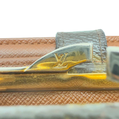 https://cdn.shopify.com/s/files/1/0564/9376/8855/files/Louis_Vuitton_Geldbeutel_Viennois_monogram_braun_9_6b0f54b5-f6cf-4985-a9ae-f91d24a22201.webp?v=1782983793