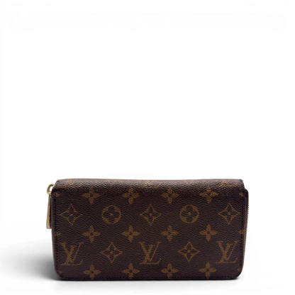 https://cdn.shopify.com/s/files/1/0564/9376/8855/files/Louis_Vuitton_Geldbeutel_Zippy_monogram_braun_1.webp?v=1784241675