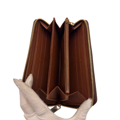 https://cdn.shopify.com/s/files/1/0564/9376/8855/files/Louis_Vuitton_Geldbeutel_Zippy_monogram_braun_14.webp?v=1784241675
