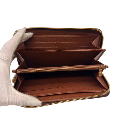 https://cdn.shopify.com/s/files/1/0564/9376/8855/files/Louis_Vuitton_Geldbeutel_Zippy_monogram_braun_15.webp?v=1784241676