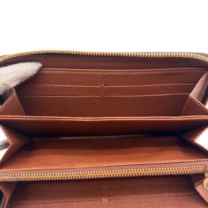 https://cdn.shopify.com/s/files/1/0564/9376/8855/files/Louis_Vuitton_Geldbeutel_Zippy_monogram_braun_16.webp?v=1784241676
