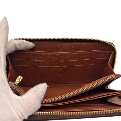 https://cdn.shopify.com/s/files/1/0564/9376/8855/files/Louis_Vuitton_Geldbeutel_Zippy_monogram_braun_17.webp?v=1784241675