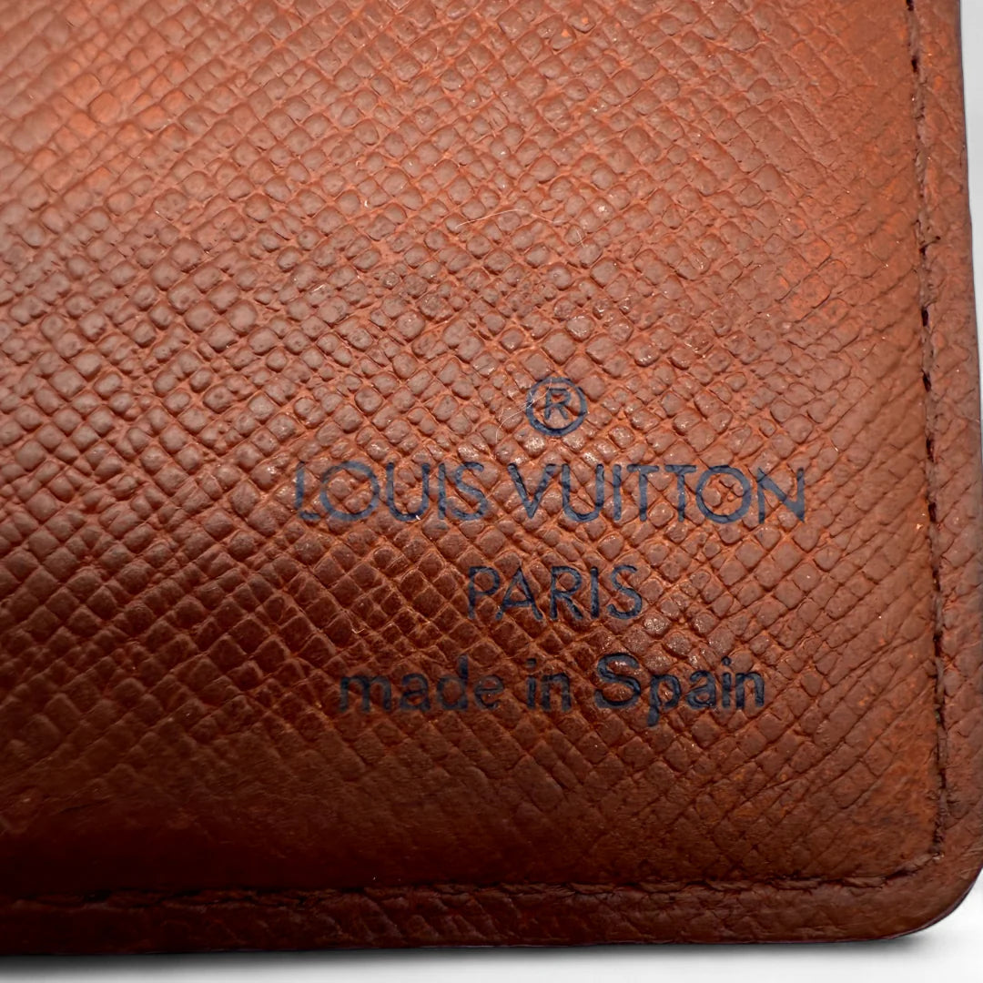 https://cdn.shopify.com/s/files/1/0564/9376/8855/files/Louis_Vuitton_Geldbeutel_monogram_braun_vintage_LV_wallet2503.webp?v=1762426365