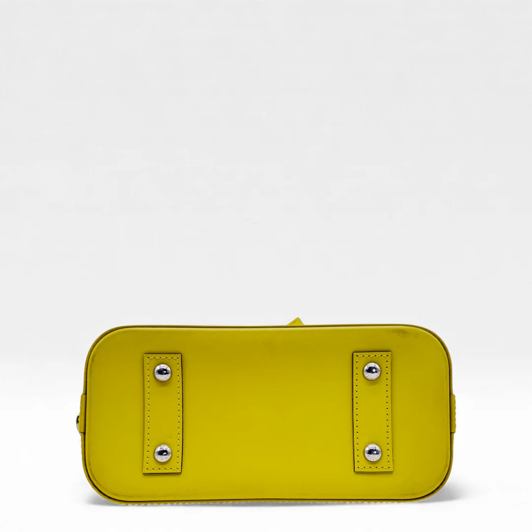 https://cdn.shopify.com/s/files/1/0564/9376/8855/files/Louis_Vuitton_Handtasche_Alma_BB_Epi_Leder_neongelb_vintage_LV_5768.webp?v=1765453894