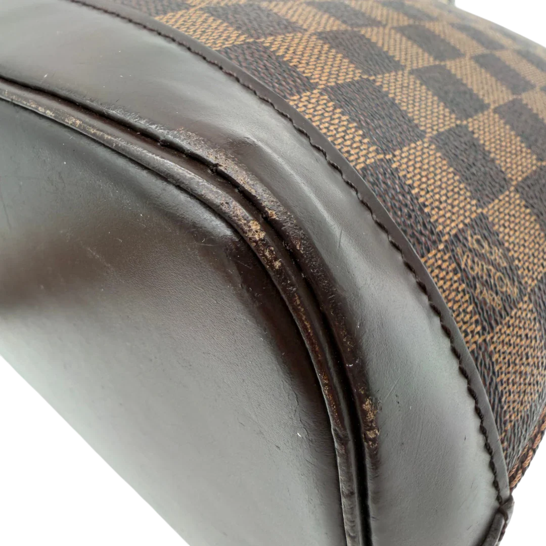 https://cdn.shopify.com/s/files/1/0564/9376/8855/files/Louis_Vuitton_Handtasche_Alma_MM_Damier_Ebene_braun_vintage_LV5941.webp?v=1778199020