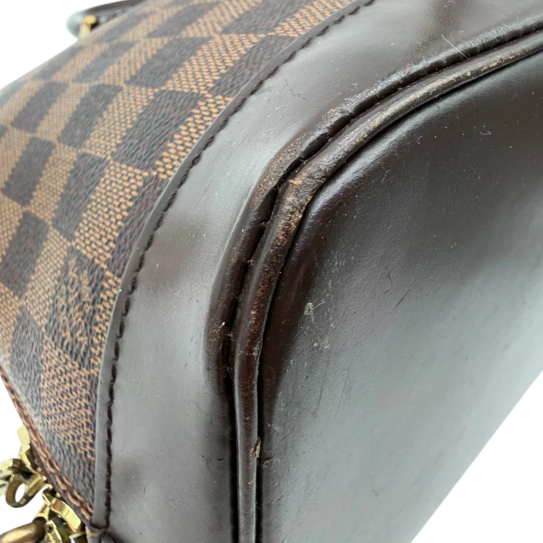 https://cdn.shopify.com/s/files/1/0564/9376/8855/files/Louis_Vuitton_Handtasche_Alma_MM_Damier_Ebene_braun_vintage_LV5942.webp?v=1778199021