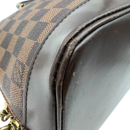 https://cdn.shopify.com/s/files/1/0564/9376/8855/files/Louis_Vuitton_Handtasche_Alma_MM_Damier_Ebene_braun_vintage_LV5942.webp?v=1778199021