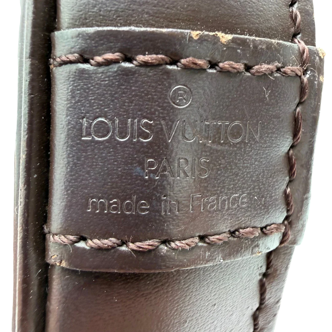 https://cdn.shopify.com/s/files/1/0564/9376/8855/files/Louis_Vuitton_Handtasche_Alma_MM_Damier_Ebene_braun_vintage_LV5946.webp?v=1778199021