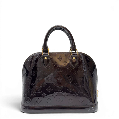 https://cdn.shopify.com/s/files/1/0564/9376/8855/files/Louis_Vuitton_Handtasche_Alma_PM_Vernis_monogram_dunkelrot_1.webp?v=1783516869