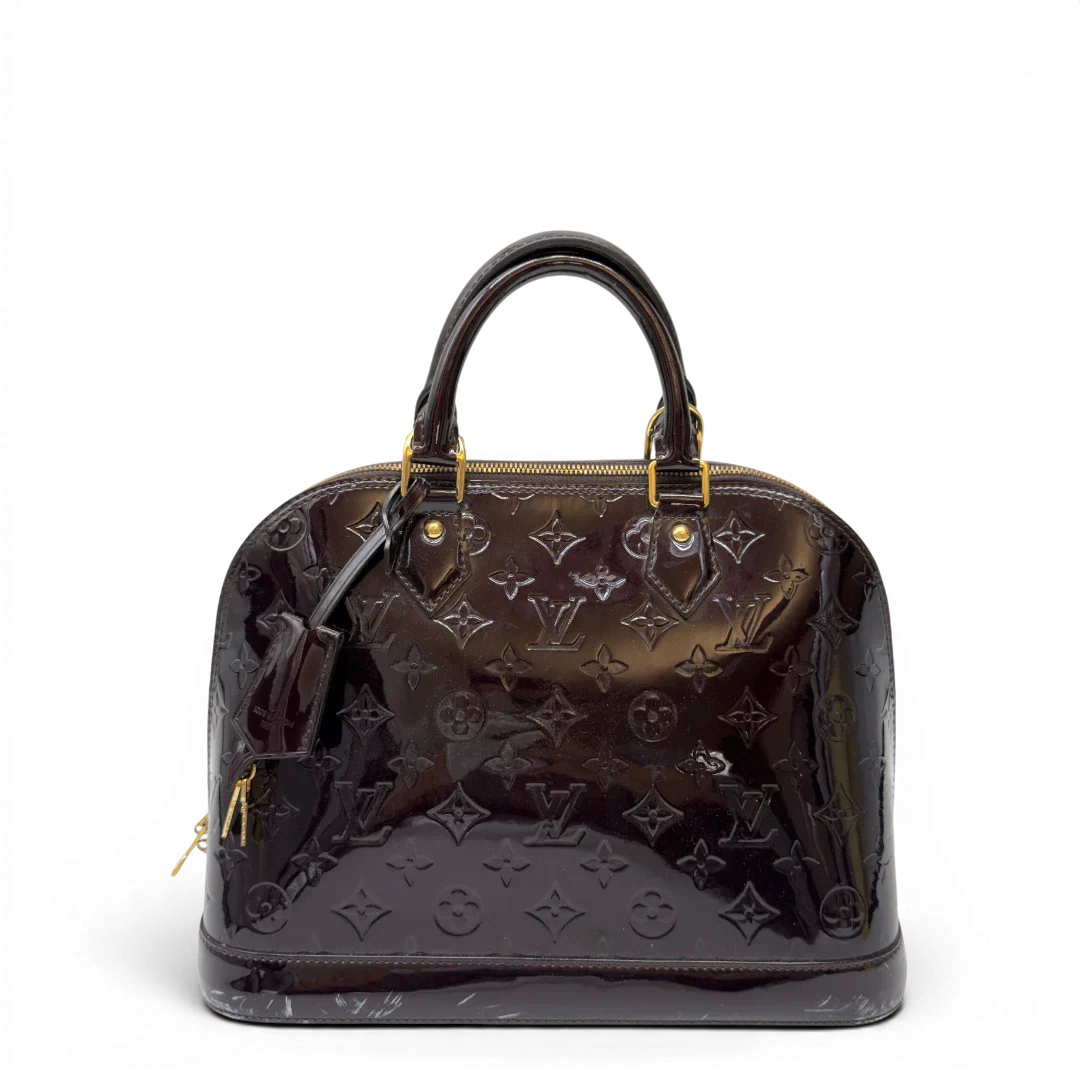 https://cdn.shopify.com/s/files/1/0564/9376/8855/files/Louis_Vuitton_Handtasche_Alma_PM_Vernis_monogram_dunkelrot_2.webp?v=1783516869