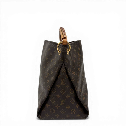 https://cdn.shopify.com/s/files/1/0564/9376/8855/files/Louis_Vuitton_Handtasche_Artsy_MM_monogram_braun_vintage_LV0019.webp?v=1775658432