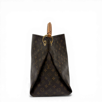https://cdn.shopify.com/s/files/1/0564/9376/8855/files/Louis_Vuitton_Handtasche_Artsy_MM_monogram_braun_vintage_LV0020.webp?v=1775658432