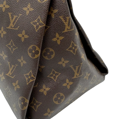 https://cdn.shopify.com/s/files/1/0564/9376/8855/files/Louis_Vuitton_Handtasche_Artsy_MM_monogram_braun_vintage_LV0032.webp?v=1775658356