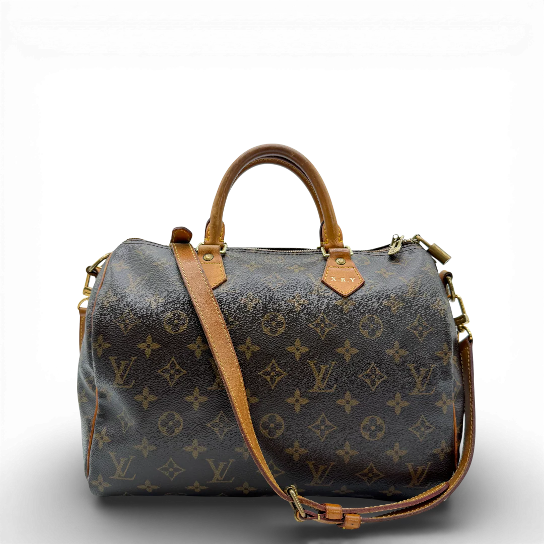 https://cdn.shopify.com/s/files/1/0564/9376/8855/files/Louis_Vuitton_Handtasche_Bandouliere_Speedy_30_monogram_braun_vintage_LV_9369.webp?v=1770948676