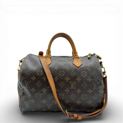 https://cdn.shopify.com/s/files/1/0564/9376/8855/files/Louis_Vuitton_Handtasche_Bandouliere_Speedy_30_monogram_braun_vintage_LV_9369.webp?v=1770948676