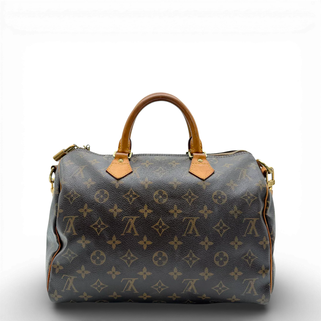 https://cdn.shopify.com/s/files/1/0564/9376/8855/files/Louis_Vuitton_Handtasche_Bandouliere_Speedy_30_monogram_braun_vintage_LV_9371.webp?v=1770948676