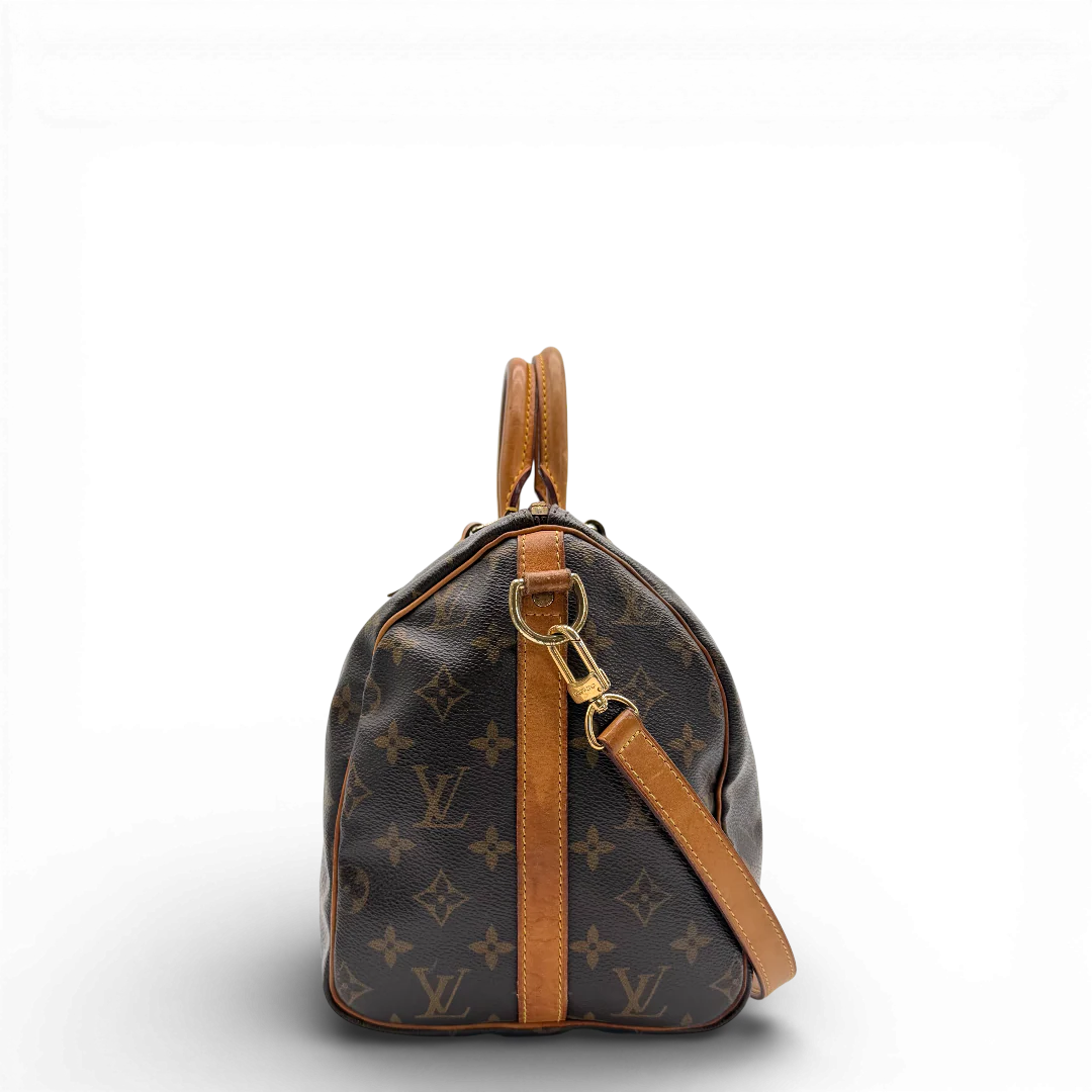 https://cdn.shopify.com/s/files/1/0564/9376/8855/files/Louis_Vuitton_Handtasche_Bandouliere_Speedy_30_monogram_braun_vintage_LV_9374.webp?v=1770948676