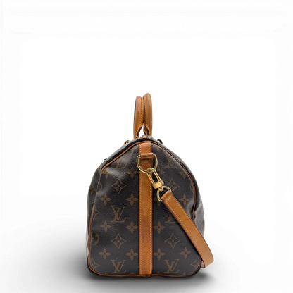 https://cdn.shopify.com/s/files/1/0564/9376/8855/files/Louis_Vuitton_Handtasche_Bandouliere_Speedy_30_monogram_braun_vintage_LV_9374.webp?v=1770948676