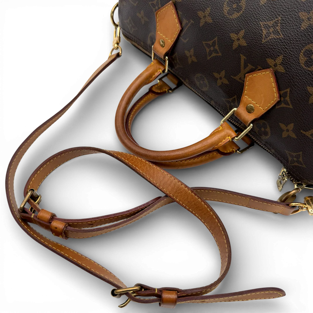 https://cdn.shopify.com/s/files/1/0564/9376/8855/files/Louis_Vuitton_Handtasche_Bandouliere_Speedy_30_monogram_braun_vintage_LV_9380.webp?v=1770948676