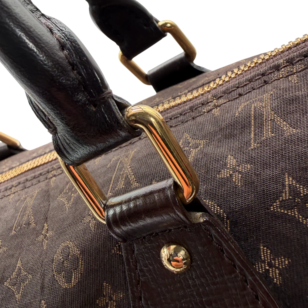https://cdn.shopify.com/s/files/1/0564/9376/8855/files/Louis_Vuitton_Handtasche_Bandouliere_Speedy_Mini_Lin_30_monogram_braun_vintage_LV_9653.webp?v=1770948873