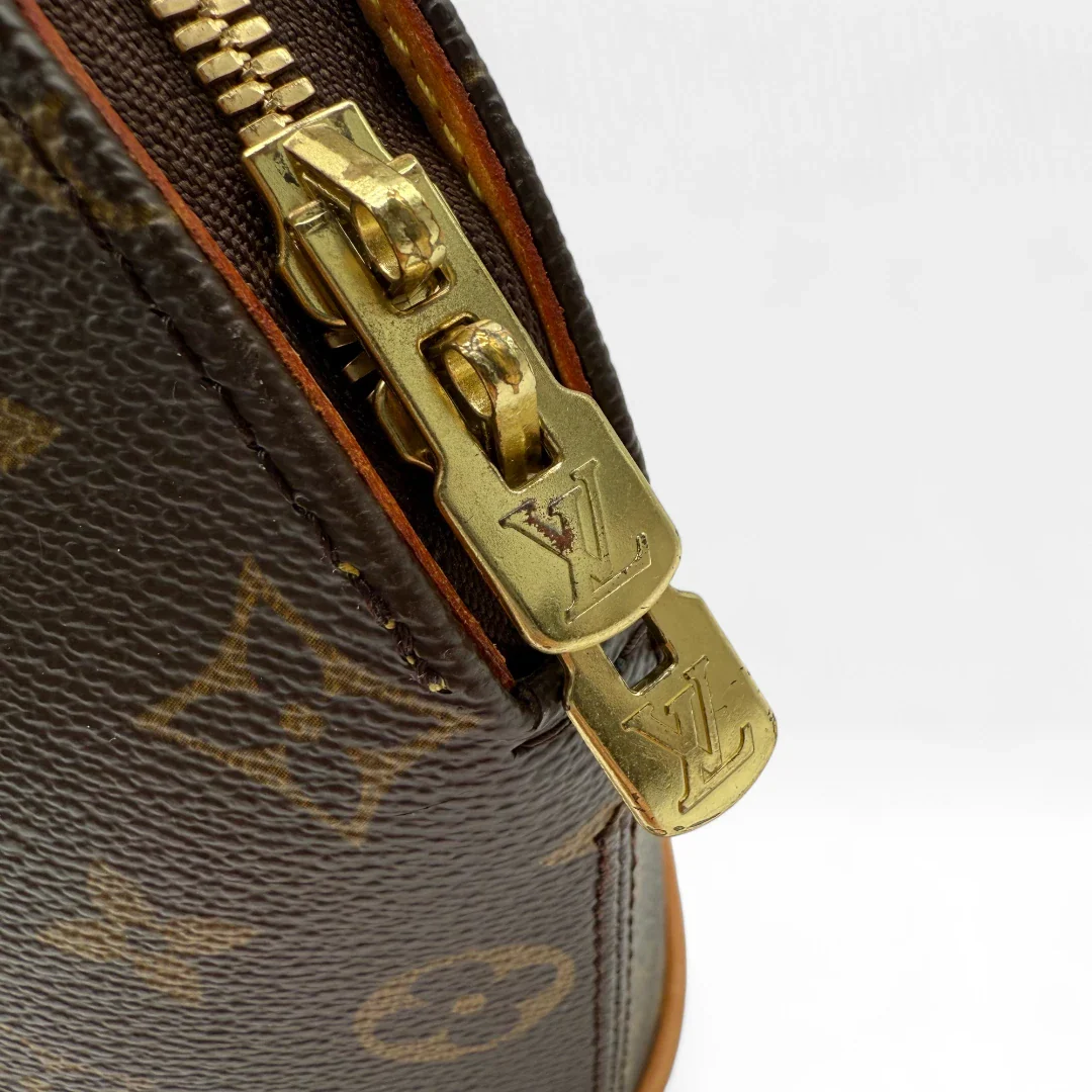 https://cdn.shopify.com/s/files/1/0564/9376/8855/files/Louis_Vuitton_Handtasche_Ellipse_PM_monogram_braun_vintage_designer_LV_handbag8740.webp?v=1750334010