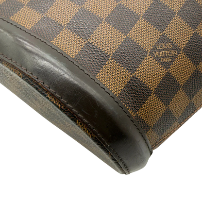 https://cdn.shopify.com/s/files/1/0564/9376/8855/files/Louis_Vuitton_Handtasche_Manosque_GM_Damier_Ebene_braun_vintage_LV8291.webp?v=1780408247
