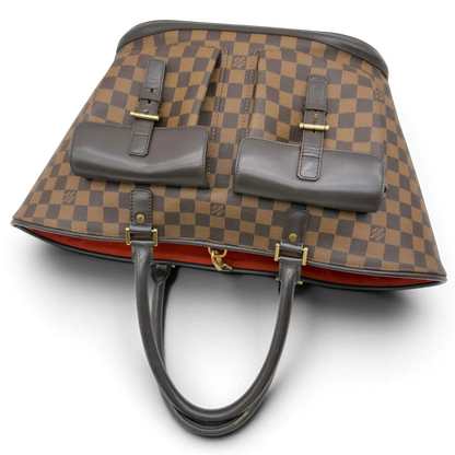 https://cdn.shopify.com/s/files/1/0564/9376/8855/files/Louis_Vuitton_Handtasche_Manosque_GM_Damier_Ebene_braun_vintage_LV8293.webp?v=1780408247