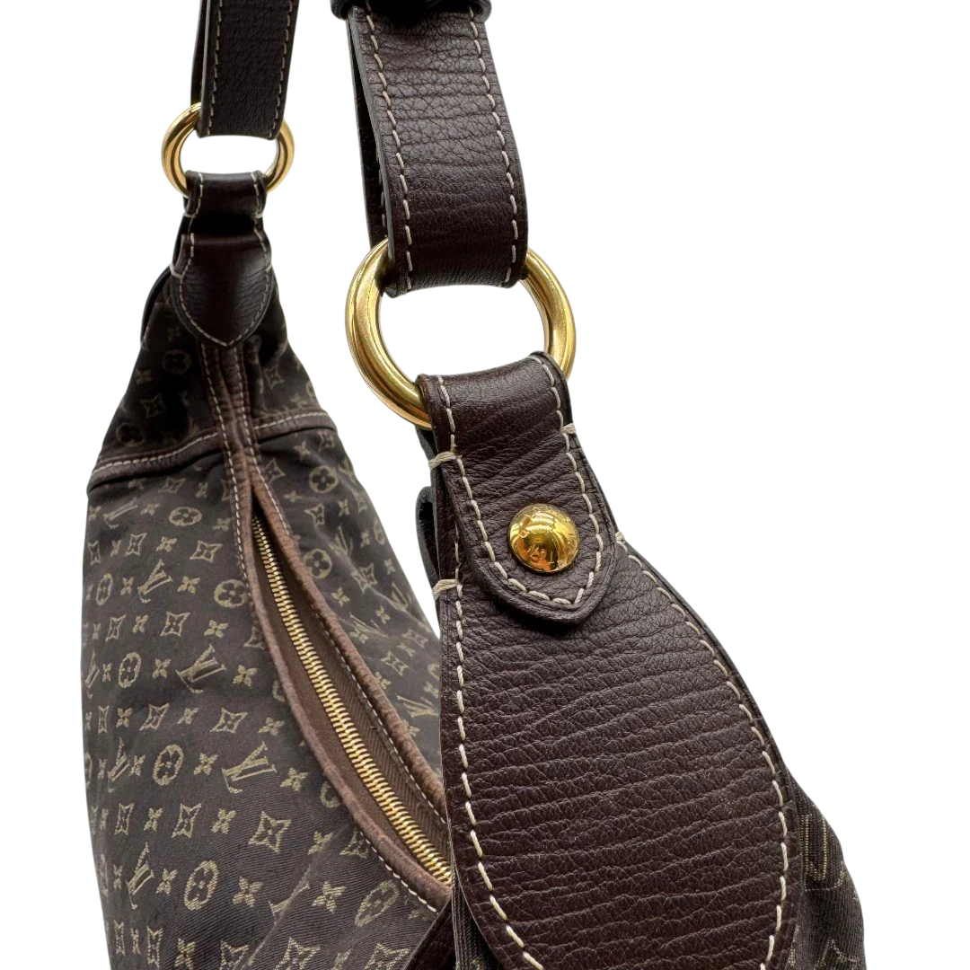 https://cdn.shopify.com/s/files/1/0564/9376/8855/files/Louis_Vuitton_Handtasche_Mini_Lin_Manon_MM_Hobo_monogram_braun_13.webp?v=1783516707