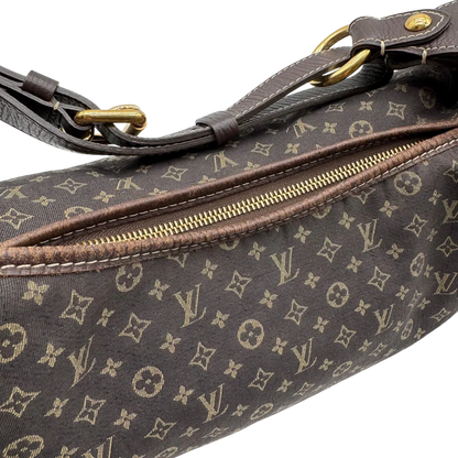 https://cdn.shopify.com/s/files/1/0564/9376/8855/files/Louis_Vuitton_Handtasche_Mini_Lin_Manon_MM_Hobo_monogram_braun_16.webp?v=1783516707